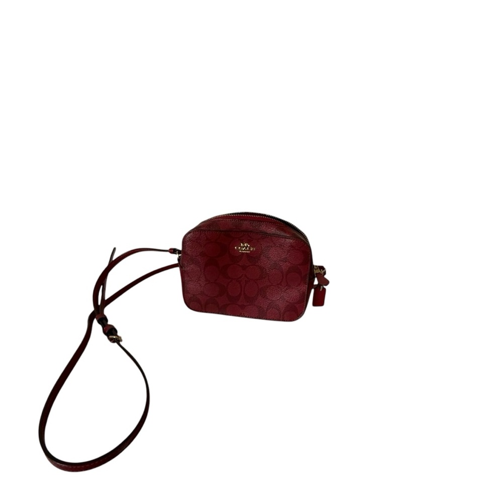 Coach Red Crossbody Bag with Leather Material and Rounded Shape